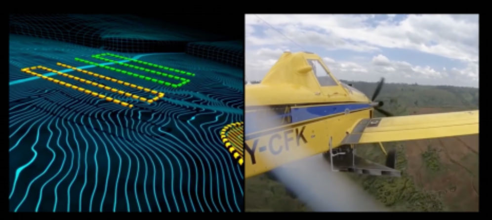 Video still. Side-by-side images show a computer-simulated or mapped ground with terrain in light blue. Two angular, S-shapes criss-cross the land in the distance. One is green and one is yellow. The image on our right is of a yellow airplane in flight, seen from just off its wing, so we are also in flight.